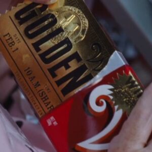golden ticket inside wonka bar in charlie the chocolate factory